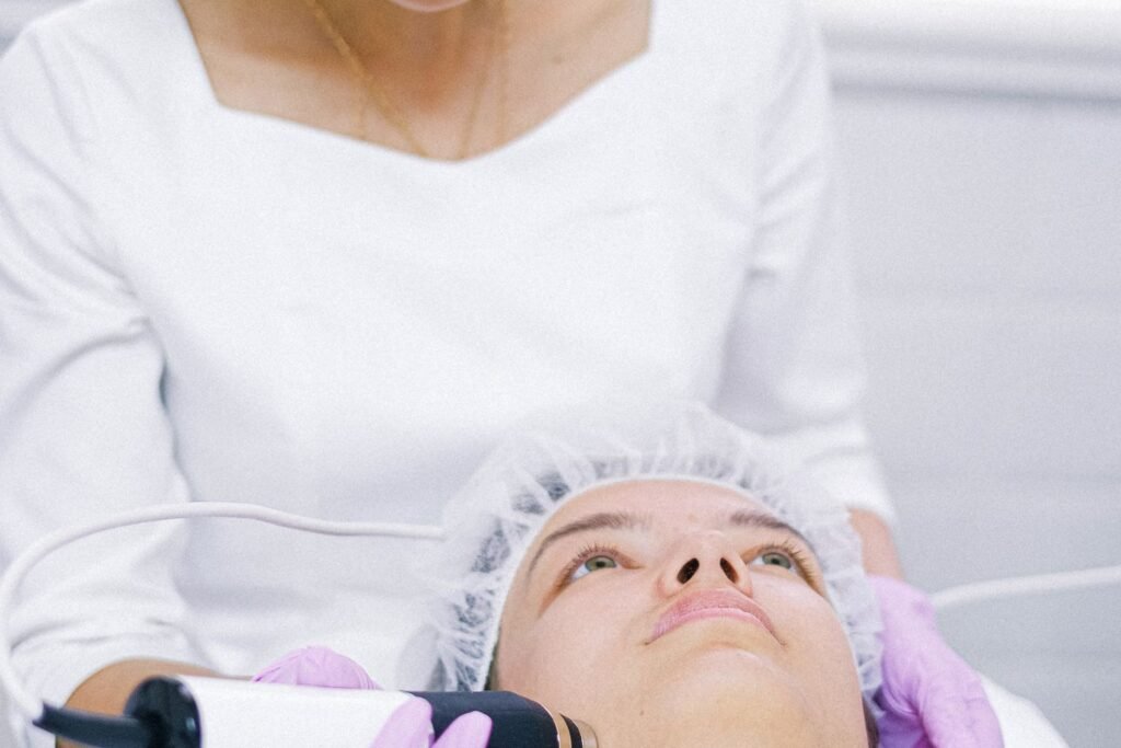 HIFU skin tightening device being used during a clinical treatment session